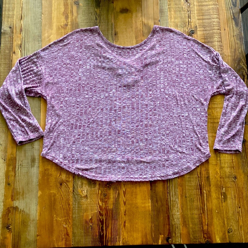 Light weight top with partial open back detail.